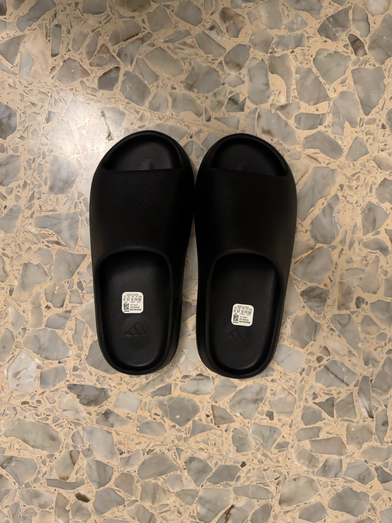 Pair of black slides viewed from above.