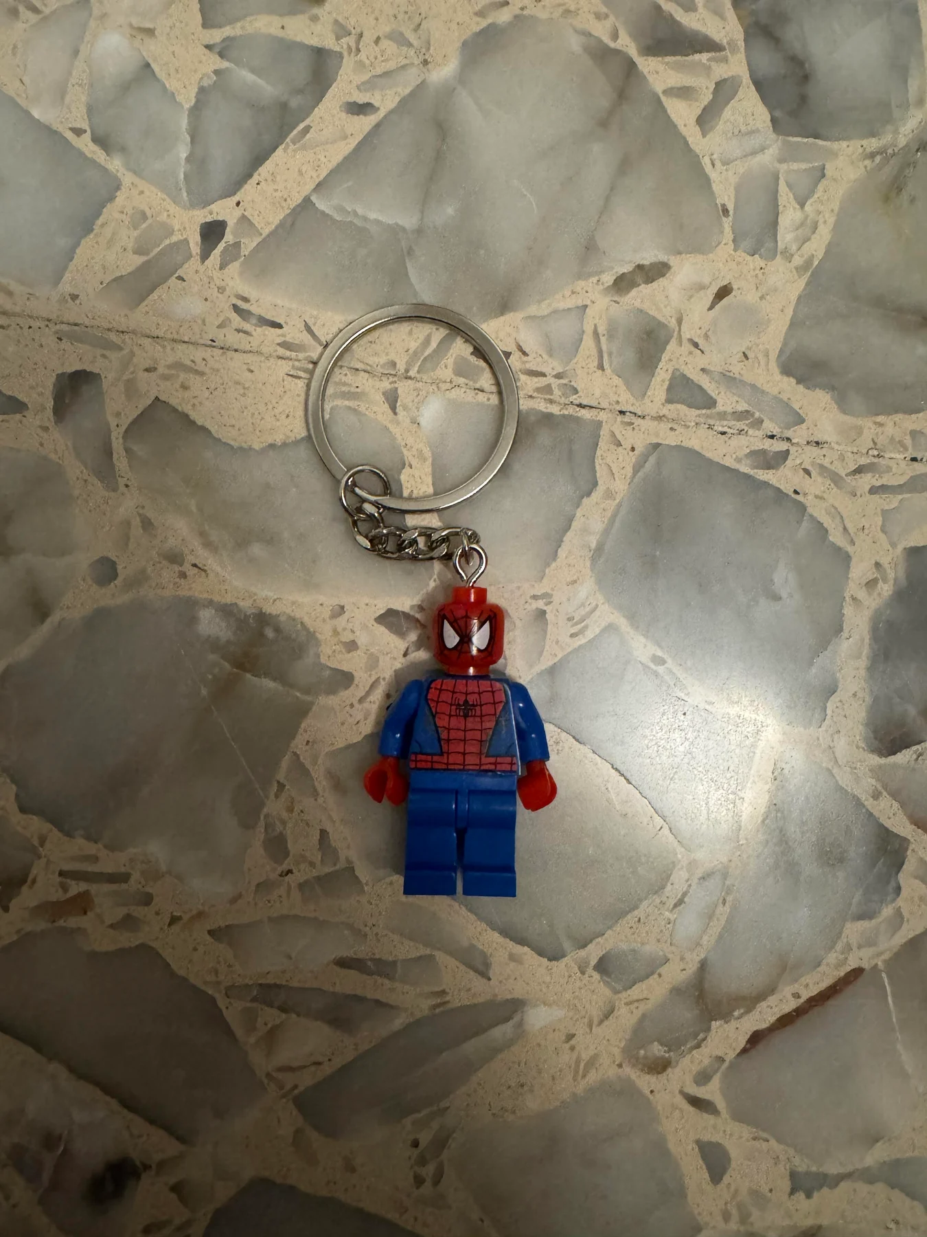 Spider-Man minifigure-style keychain.