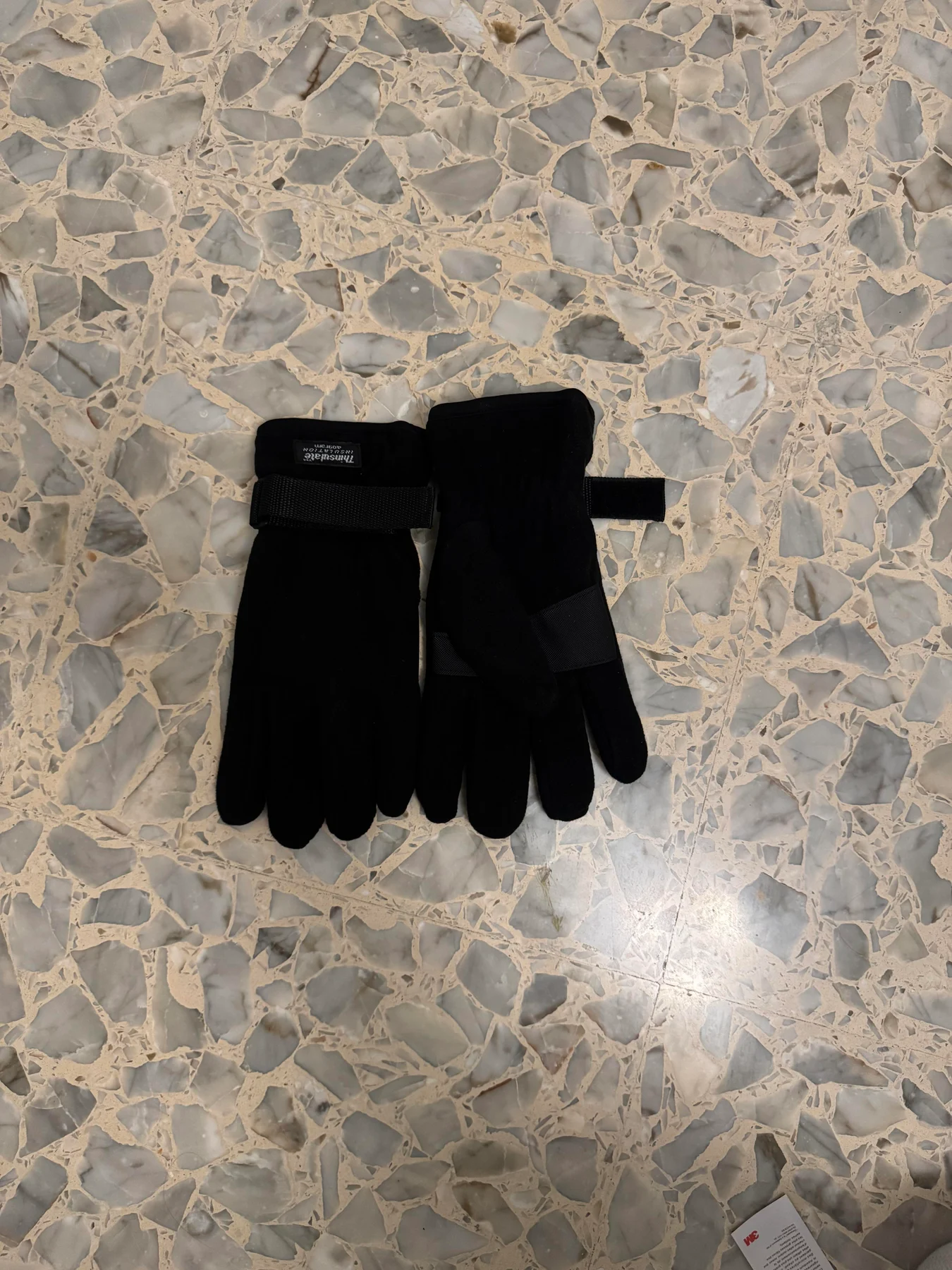 Pair of black winter gloves.